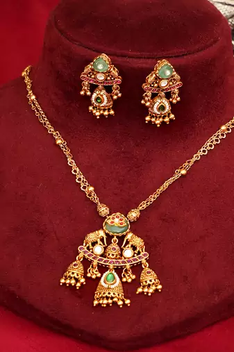 Gold plated green stones royal kundan necklace set