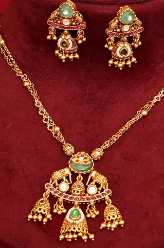 Gold plated green stones royal kundan necklace set