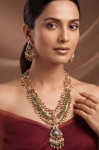 Gold plated green stones multi layered necklace set