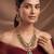 Gold plated green stones multi layered necklace set