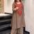 Women Ethnic Motifs Embroidered Regular Sequinned Silk Crepe Kurta with Palazzos