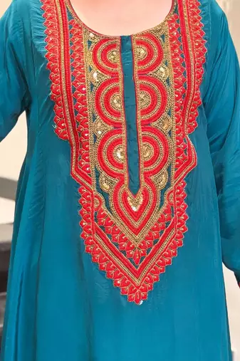 Women Ethnic Motifs Embroidered Regular Sequinned Silk Crepe Kurta with Palazzos