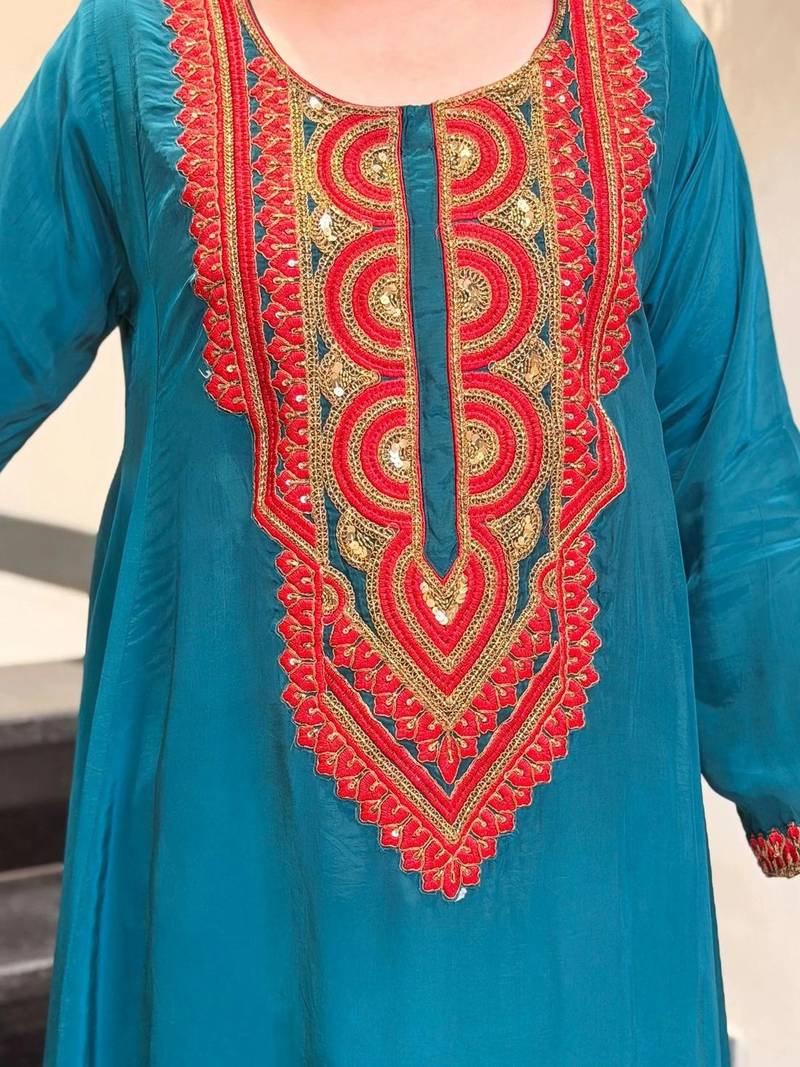 Women Ethnic Motifs Embroidered Regular Sequinned Silk Crepe Kurta with Palazzos