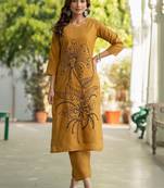 Women Floral Embroidered Cotton Kurta with Trousers