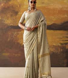 Grey modal cotton blend woven saree with zari border