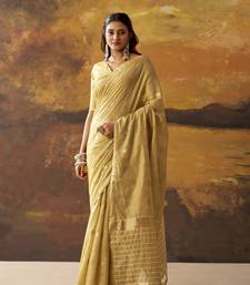 Beige modal cotton blend woven saree with zari border