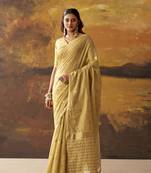 Beige modal cotton blend woven saree with zari border