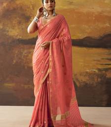 Coral modal cotton blend woven saree with zari border