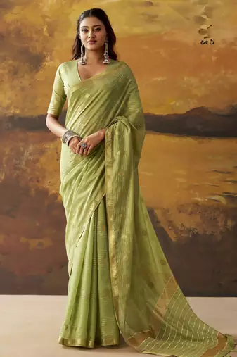 Green modal cotton blend woven saree with zari border