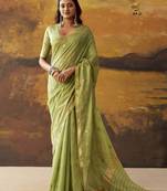 Green modal cotton blend woven saree with zari border