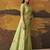 Green modal cotton blend woven saree with zari border