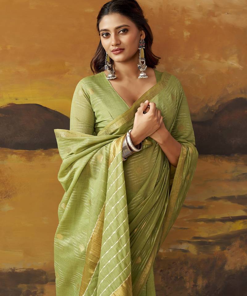 Green modal cotton blend woven saree with zari border