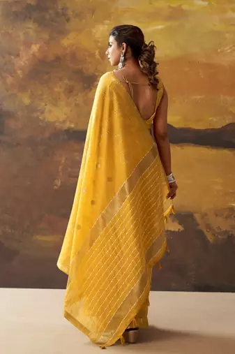 Yellow modal cotton blend woven saree with zari border