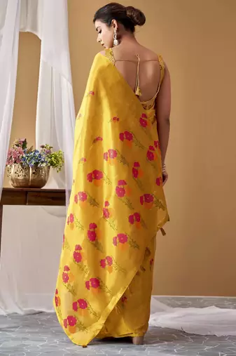 Yellow tissue silk blend floral woven saree with designer blouse