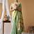 Sea green tissue silk blend floral woven saree with designer blouse