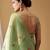 Sea green tissue silk blend floral woven saree with designer blouse