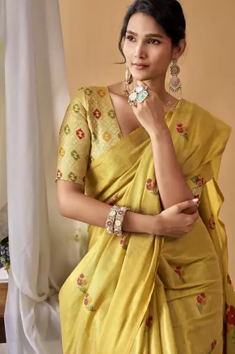 Golden yellow tissue silk blend floral woven saree with designer blouse