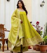 Designer halter neck bandhej kurti set with flared palazzo & leheriya dupatta for festive wear