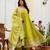 Designer halter neck bandhej kurti set with flared palazzo & leheriya dupatta for festive wear