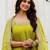 Designer halter neck bandhej kurti set with flared palazzo & leheriya dupatta for festive wear