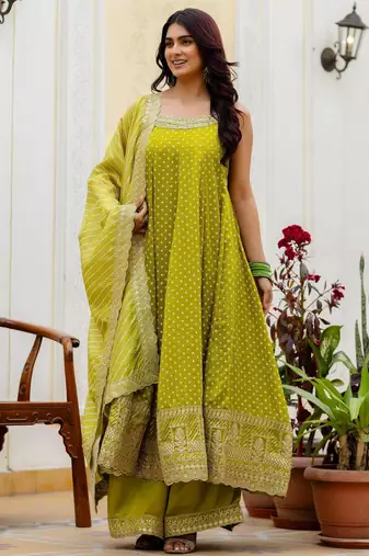 Designer halter neck bandhej kurti set with flared palazzo & leheriya dupatta for festive wear