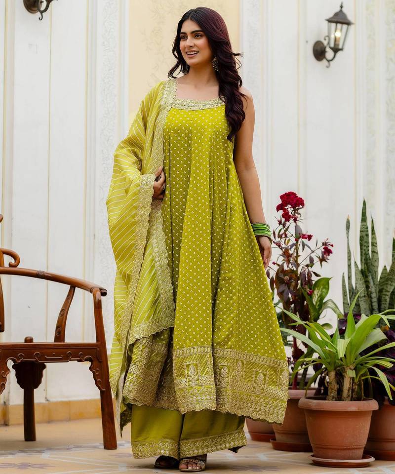 Designer halter neck bandhej kurti set with flared palazzo & leheriya dupatta for festive wear
