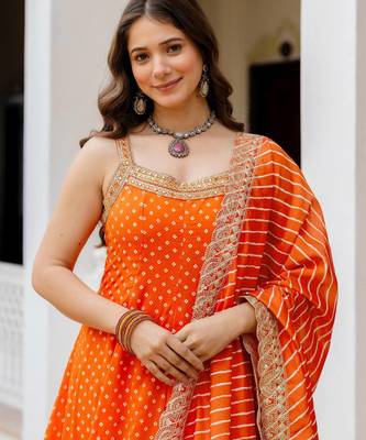Designer halter neck bandhej kurti set with flared palazzo & leheriya dupatta for festive wear 2