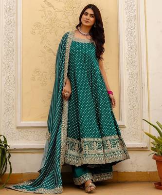 Designer halter neck bandhej kurti set with flared palazzo & leheriya dupatta for festive wear 1