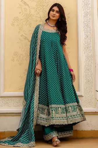 Designer halter neck bandhej kurti set with flared palazzo & leheriya dupatta for festive wear
