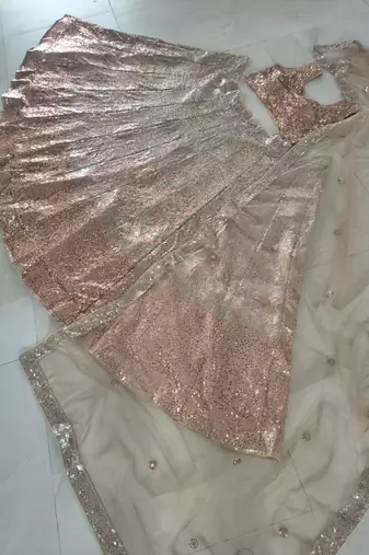 antique gold color Embellished Dual Sequins Heavy work  Net Lehenga Choli Set