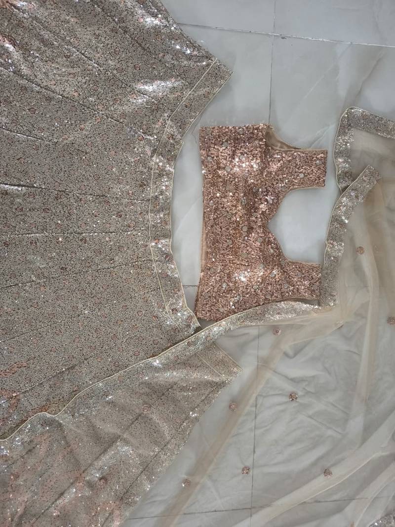 antique gold color Embellished Dual Sequins Heavy work  Net Lehenga Choli Set