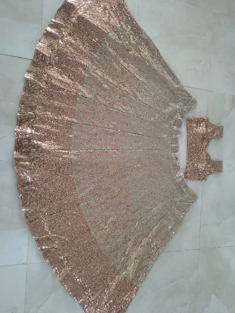 antique gold color Embellished Dual Sequins Heavy work  Net Lehenga Choli Set