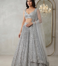 grey color Embellished With Jari Work Heavy Rainbow Dual Sequins Work Net Lehenga Choli Set