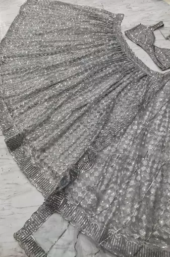 grey color Embellished With Jari Work Heavy Rainbow Dual Sequins Work Net Lehenga Choli Set