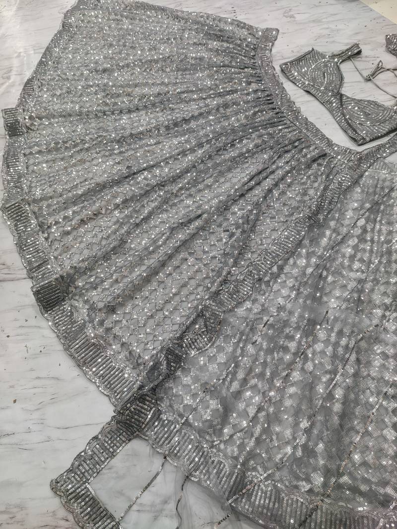 grey color Embellished With Jari Work Heavy Rainbow Dual Sequins Work Net Lehenga Choli Set
