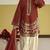 Red silk blend semi stitched suit with embroidery work