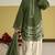 Green silk blend semi stitched suit with embroidery work