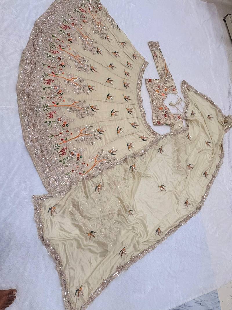 beige color Embroidery Cutwork Dori Heavy work Silk blend Lehenga Choli Set