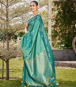 Women sea green silk blend banarasi jacquard woven saree with blouse