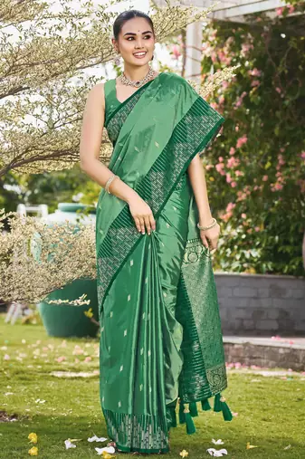 Women emerald green silk blend banarasi jacquard woven saree with blouse
