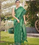 Women emerald green silk blend banarasi jacquard woven saree with blouse