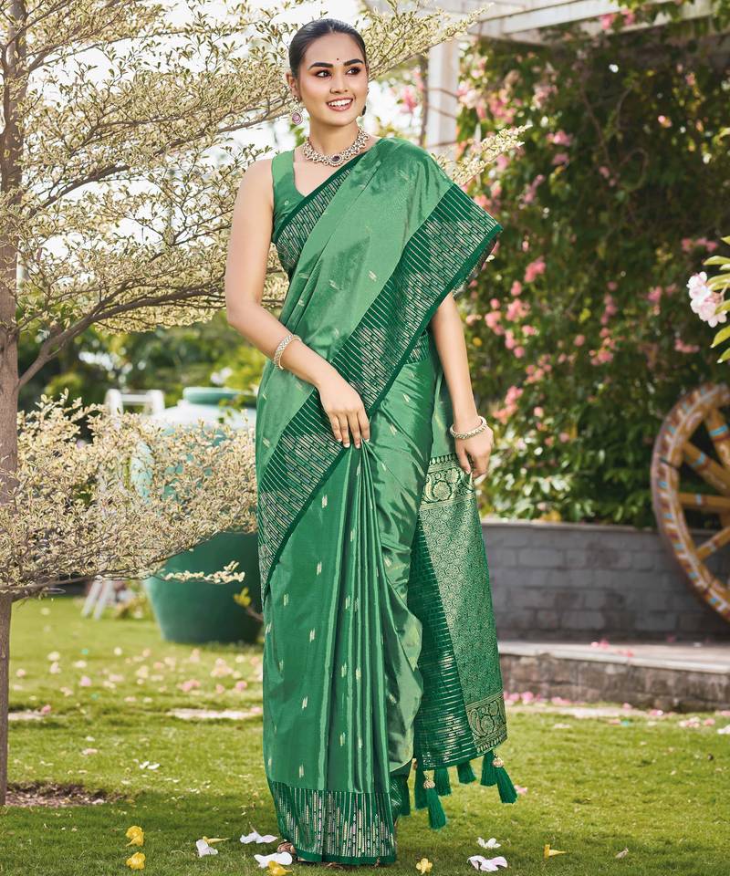 Women emerald green silk blend banarasi jacquard woven saree with blouse