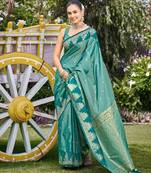 Women sea green silk blend banarasi jacquard woven saree with blouse