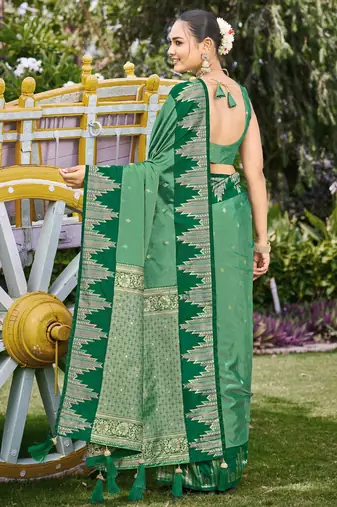 Women emerald green silk blend banarasi jacquard woven saree with blouse
