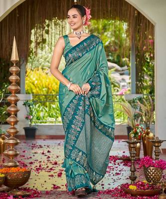 Women sea green silk blend banarasi jacquard woven saree with blouse 1