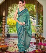 Women sea green silk blend banarasi jacquard woven saree with blouse