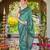 Women sea green silk blend banarasi jacquard woven saree with blouse