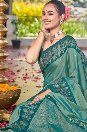 Women sea green silk blend banarasi jacquard woven saree with blouse
