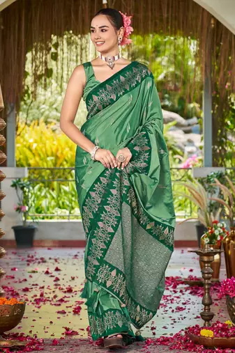 Women emerald green silk blend banarasi jacquard woven saree with blouse