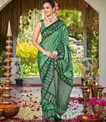 Women emerald green silk blend banarasi jacquard woven saree with blouse